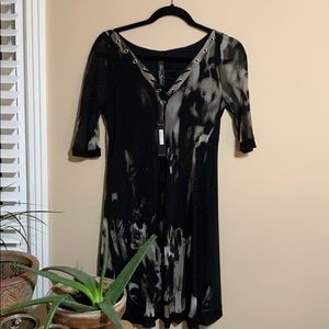 Mini patterned black dress. Elana Kattan